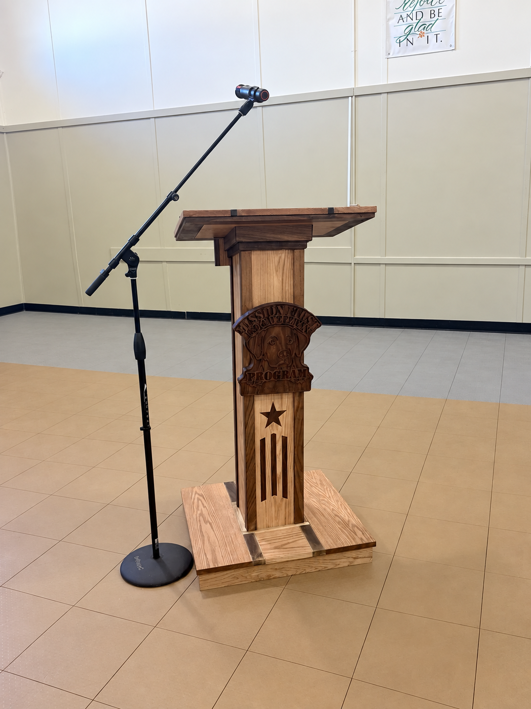 Completed custom hardwood podium with carved organizational emblem
